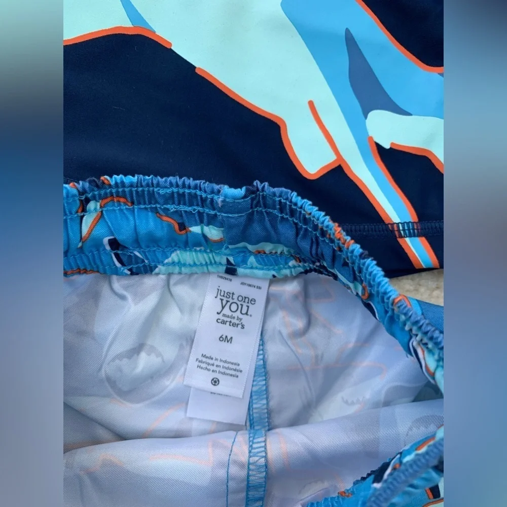 Carter’s Three Piece Swim Set with Bucket Hat, Rash Guard and Shark Swim Trunks